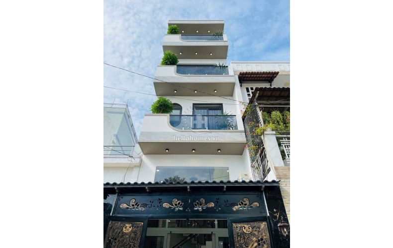 Nhà đẹp 1 lửng, 3 lầu, hẻm xe hơi 5m gần bờ kênh Tham Lương, P.15, Gò Vấp, 4x13m, 6 tỷ 900